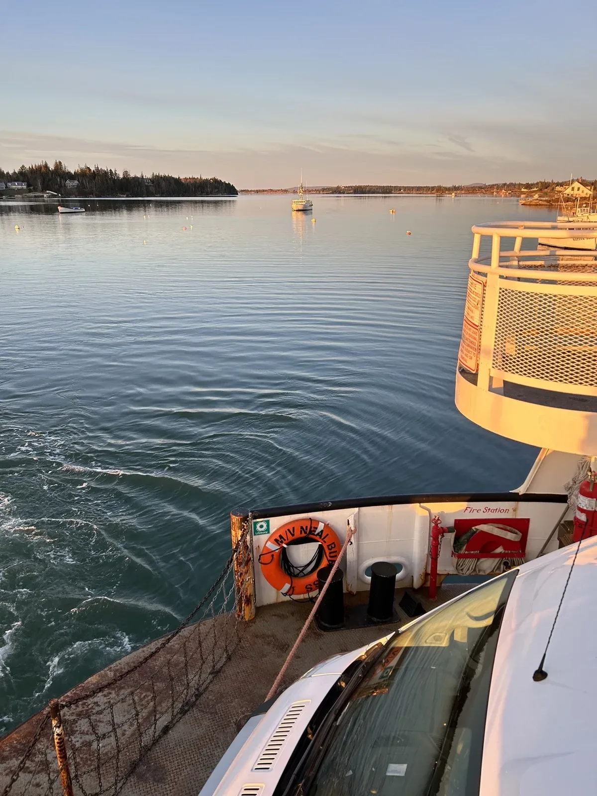 The North Haven Market truck on the Maine State Ferry at golden hour, crossing Penobscot Bay back to the island